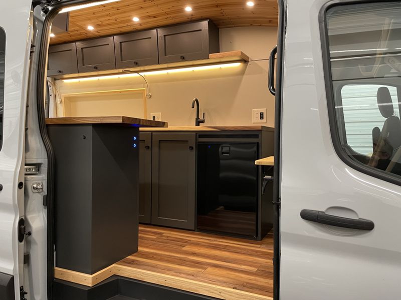 Picture 1/16 of a 2023 AWD Ford Transit 350 Ecoboost High Roof for sale in Kalispell, Montana