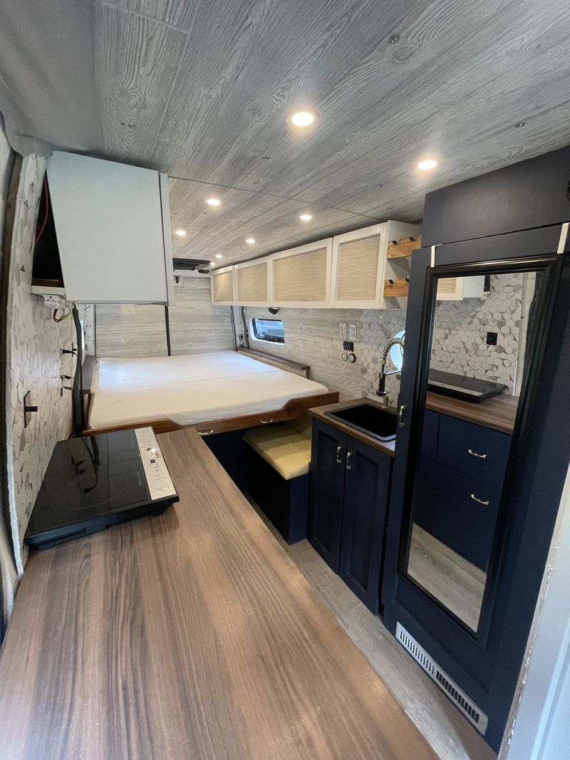 Picture 2/10 of a HUGE Solar/Electrical, decked out converted Sprinter for sale in Indianapolis, Indiana