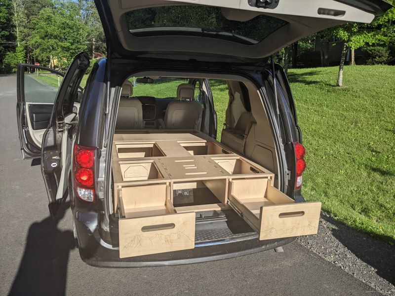 Picture 1/13 of a Minivan with light-weight camper conversion kit for sale in Detroit, Michigan