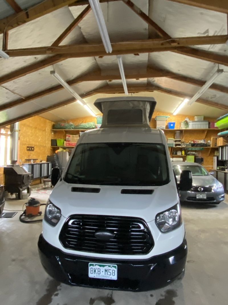 Picture 4/8 of a 2018 Ford T250 Camper Van with pop-up sleeper/camper top for sale in Berthoud, Colorado