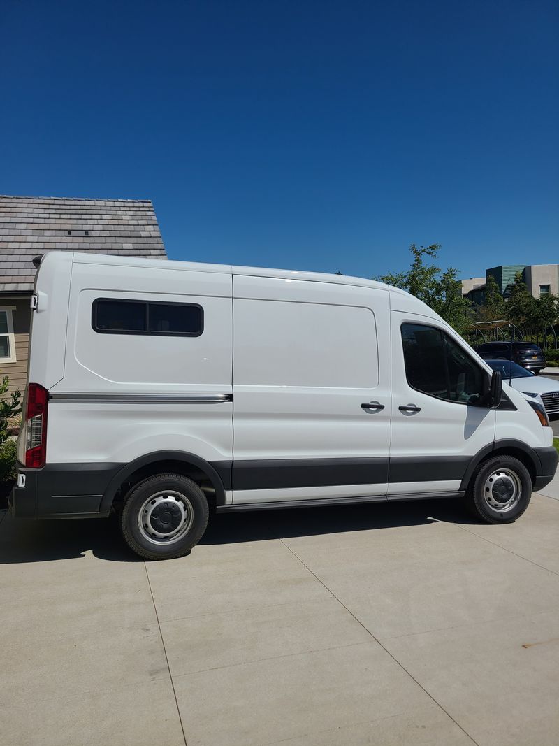 Picture 1/8 of a 2019 Medium Roof Ford Transit 130WB for sale in Big Bear Lake, California