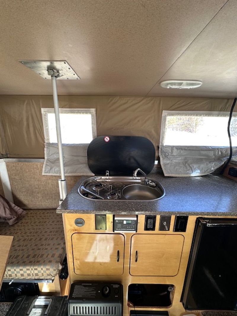 Picture 5/8 of a 2011 GMC Duramax with Phoenix Pop Up for sale in Grand Lake, Colorado