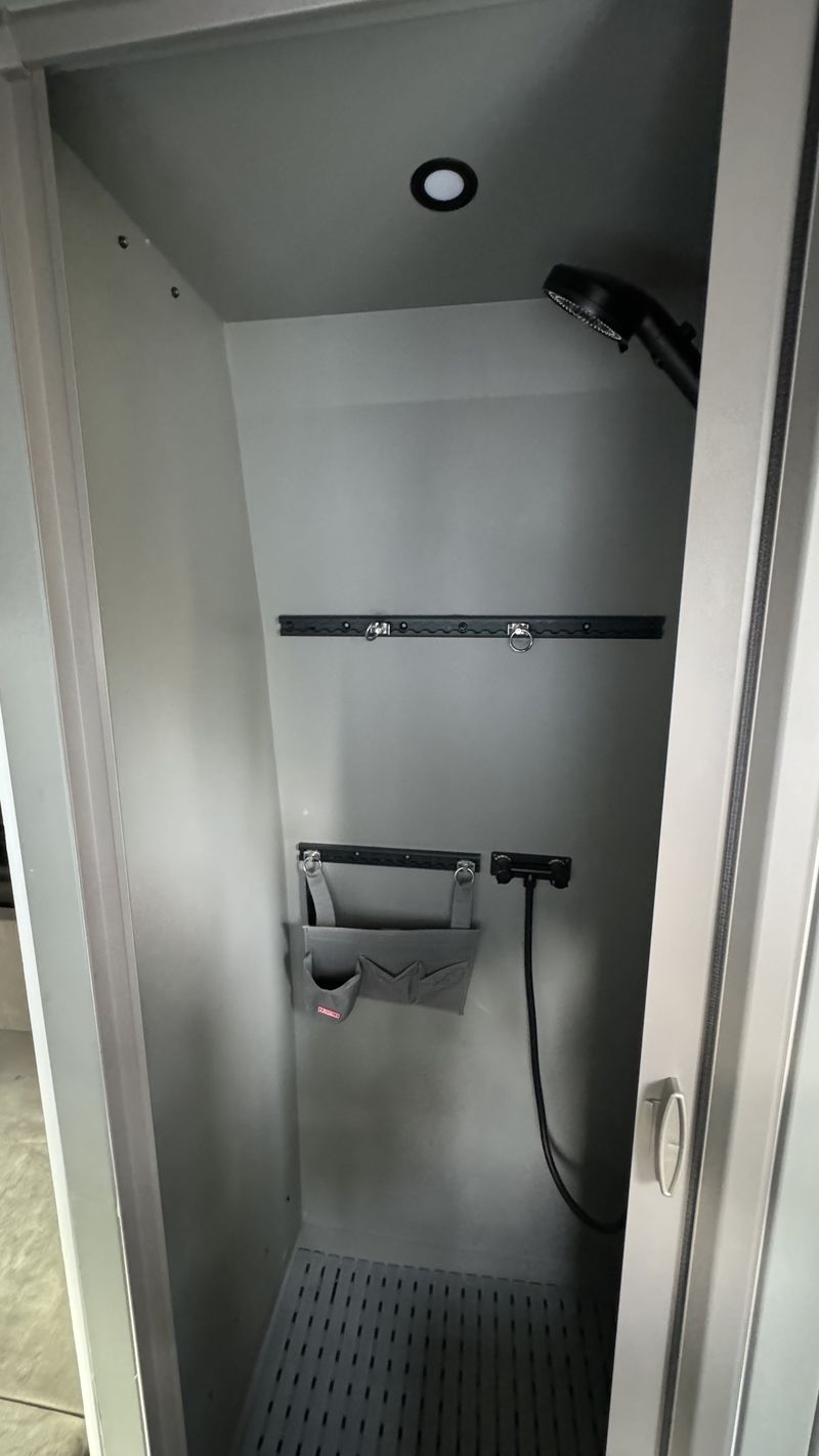 Picture 2/31 of a 144 Sprinter van Sleeps/sits 5 with bathroom & elevator bed  for sale in Big Bear City, California