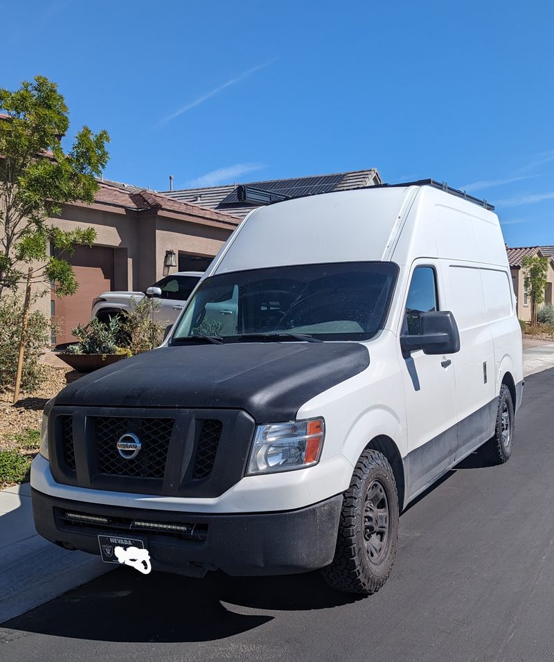 Picture 1/16 of a 2012 Nissan NV 2500HD V8 High Roof Adventure Camper Van for sale in Henderson, Nevada
