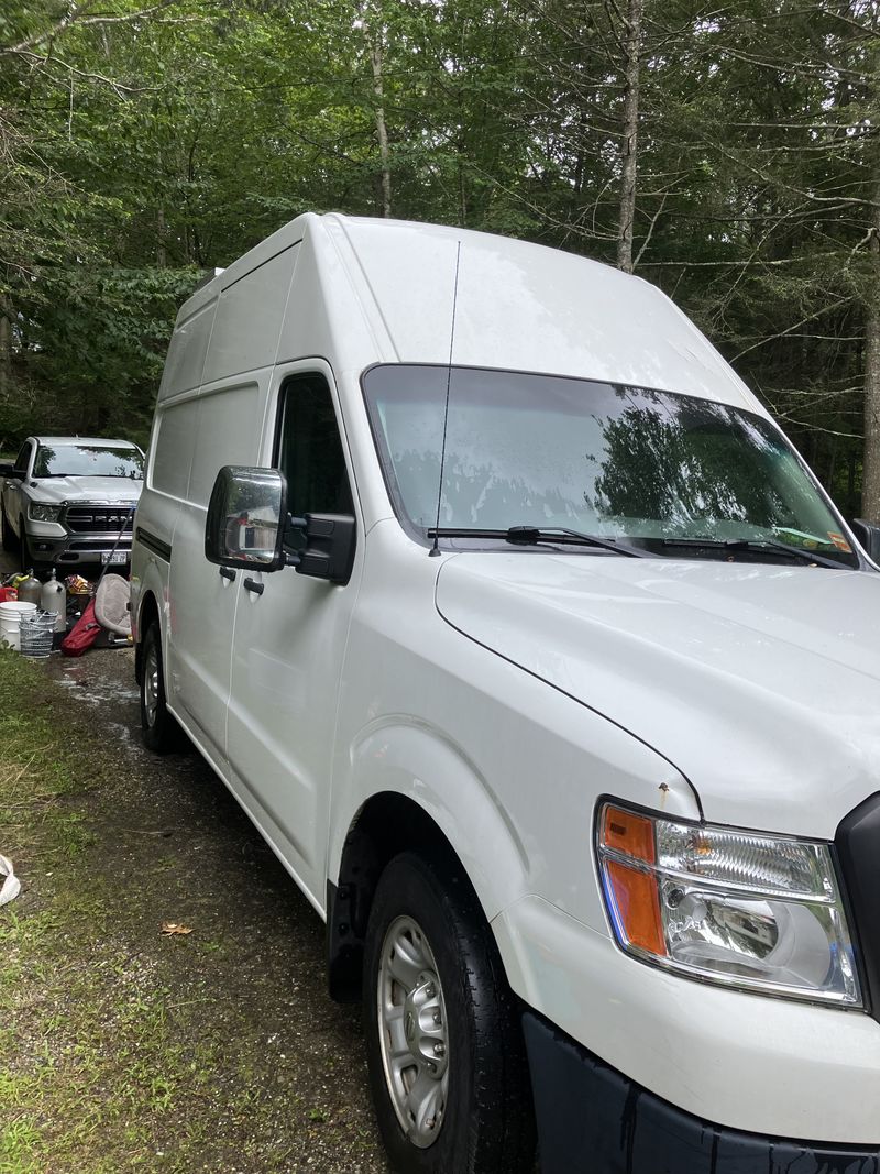 Picture 1/19 of a 2015 Nissan NV 2500 HD high top solar panels and fans for sale in Freeport, Maine