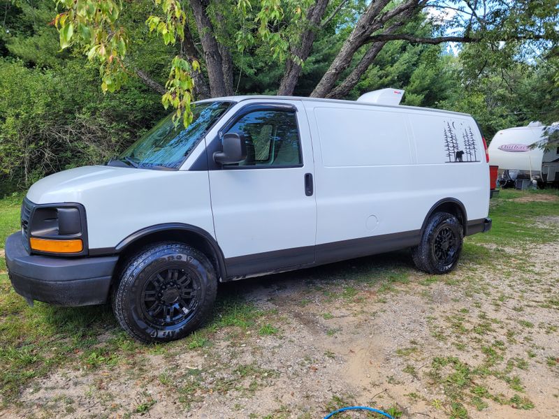 Picture 1/13 of a 2009 GMC Savana 2500 6.0l camper van for sale in Grand Rapids, Michigan