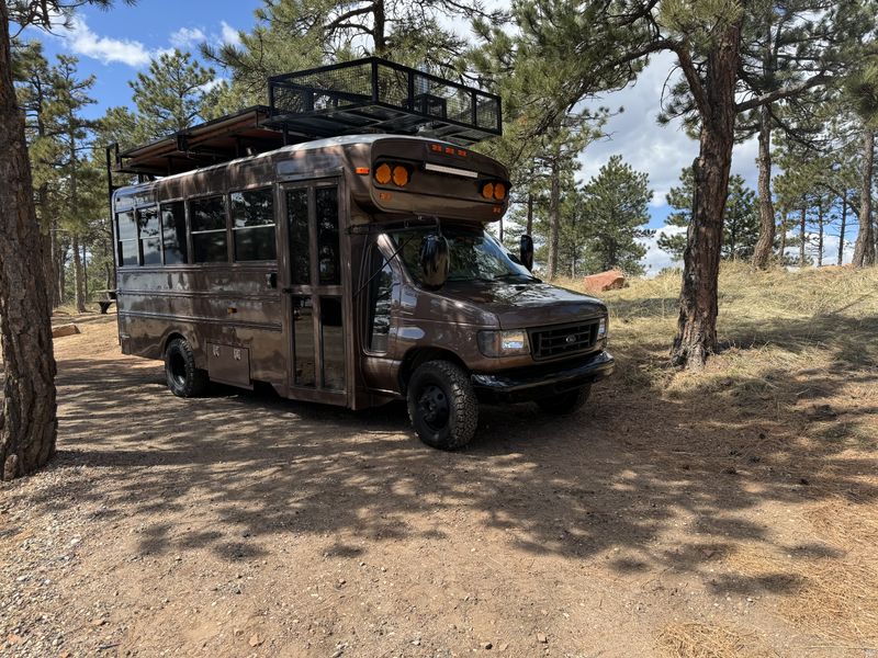 Picture 1/16 of a 2003 Ford E-450 SuperDuty 7.3L powerstroke Skoolie for sale in Boulder, Colorado