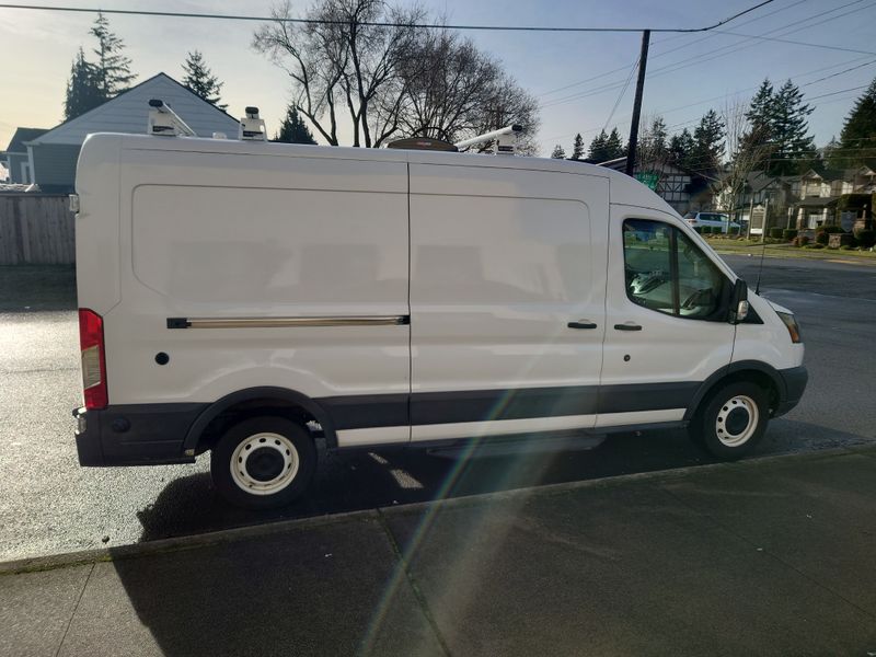 Picture 2/12 of a Ford Transit T-150 Mid roof for sale in Tacoma, Washington