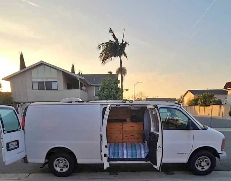 Picture 1/9 of a 2002 chevy express off grid for sale in Highland, California