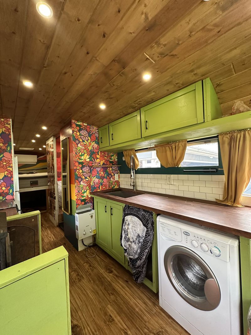 Picture 1/15 of a 1993 Bluebird All American Skoolie Conversion w/ ROOF RAISE for sale in Charlotte, North Carolina