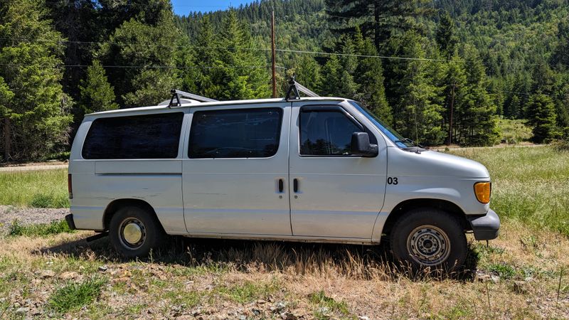 Picture 4/18 of a 2003 Ford E-150 stealthy camper van build for sale in Linden, Michigan