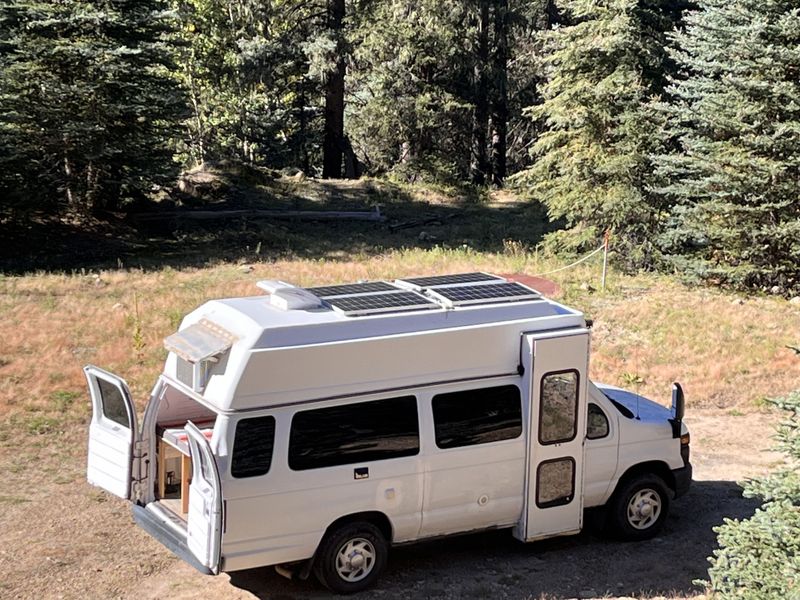 Picture 1/19 of a 2014 Ford E-350 High Roof 400W Solar for sale in Denver, Colorado