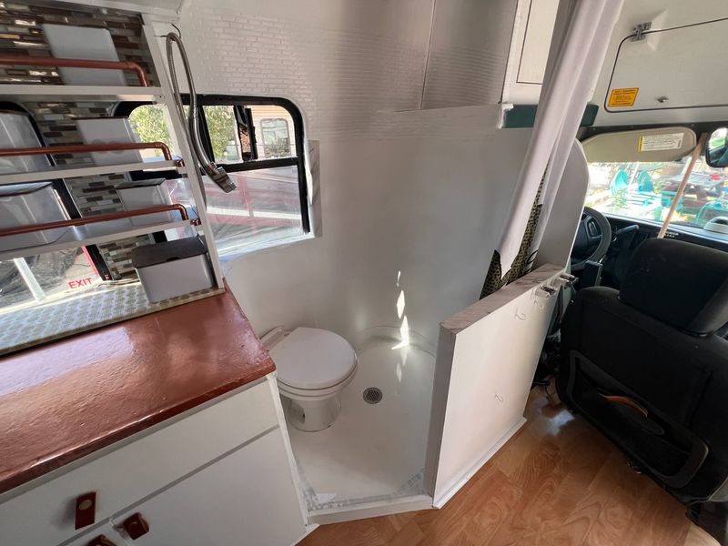 Picture 2/13 of a Fully converted bus ready to camp in style and comfort for sale in Corona, California