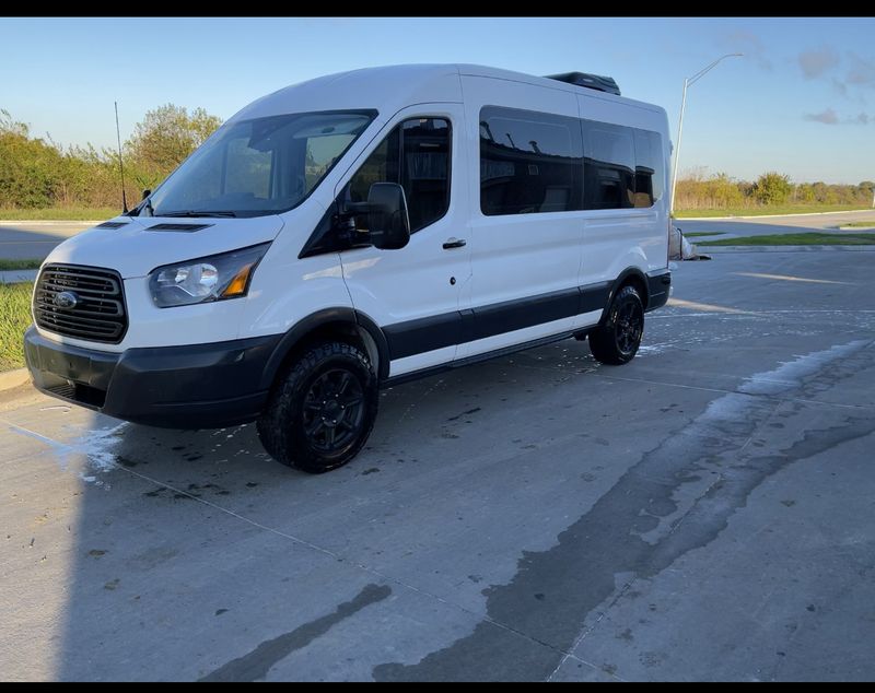 Picture 1/12 of a 2018 ford transit mid roof  for sale in Gardner, Kansas