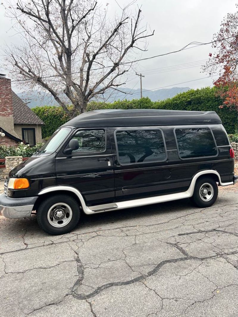 Picture 1/10 of a 2002 Dodge ram wagon 1500 Van for sale in Sunset Beach, California