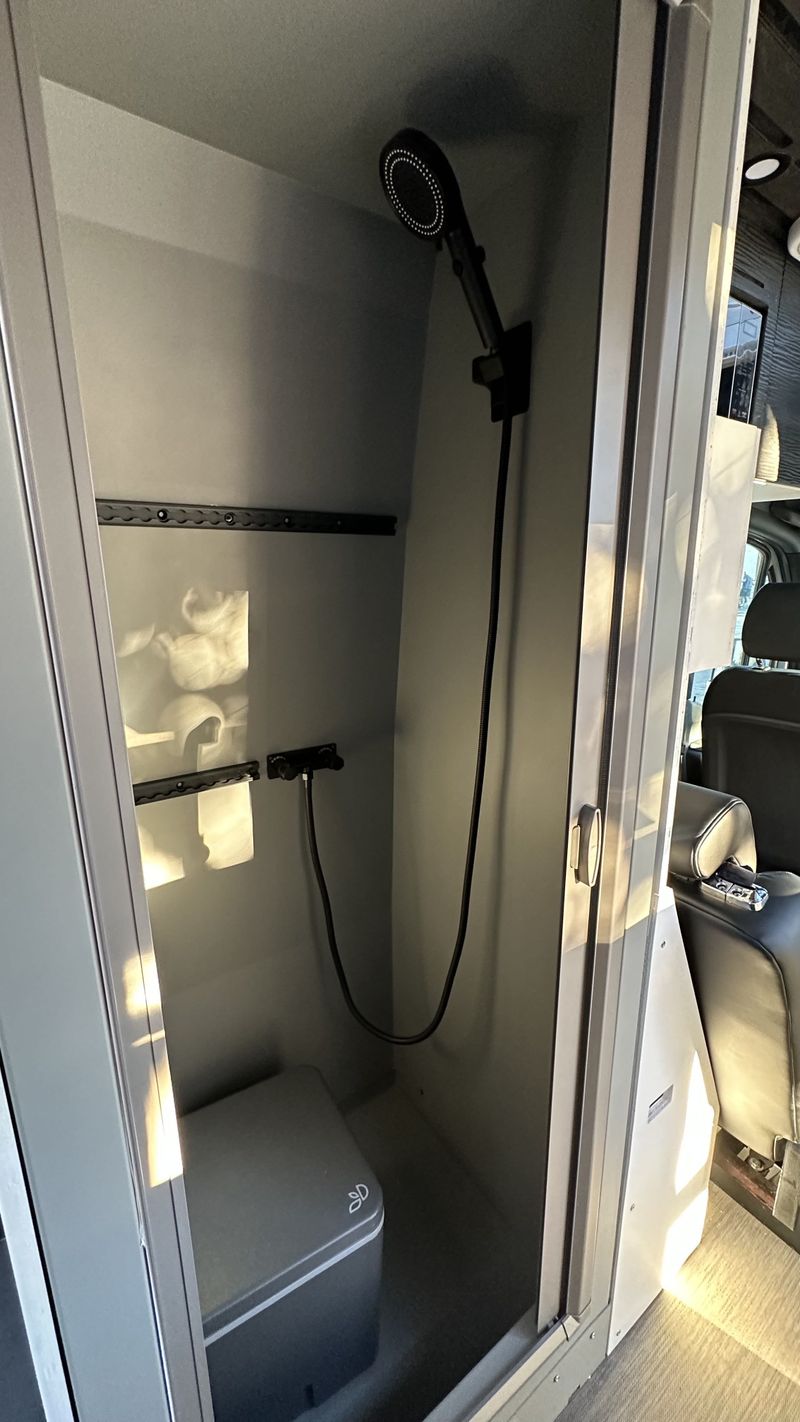 Picture 2/18 of a 144 Sprinter sits & sleeps 5 / ELEVATOR BED / bathroom / A/C for sale in Big Bear City, California