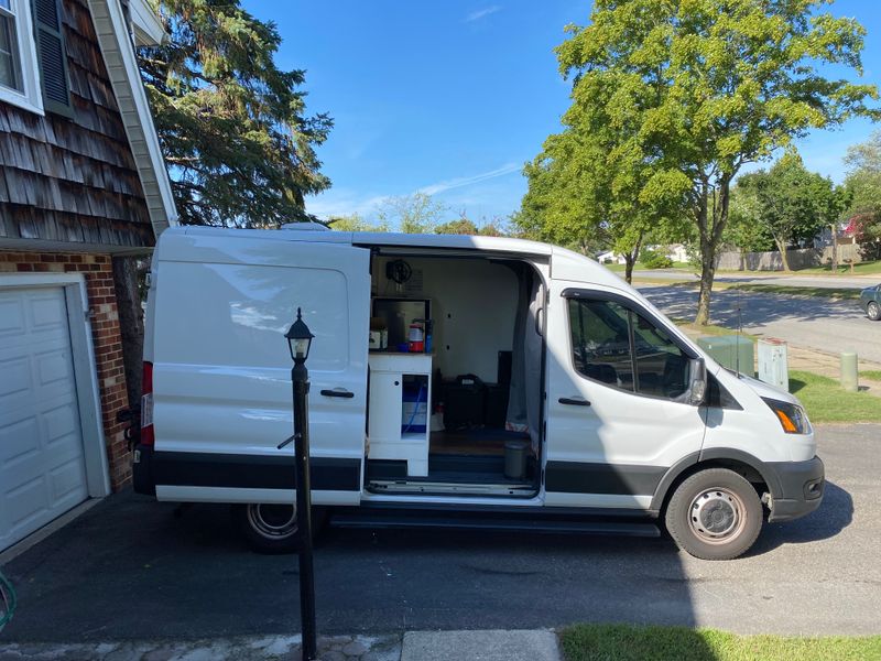 Picture 1/12 of a 2020 Ford transit 250 medium roof camper van built for sale in Miami, Florida