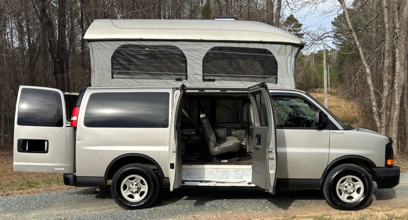 Picture 1/32 of a One of a kind! Flexible passenger van with huge pop top! for sale in Raleigh, North Carolina