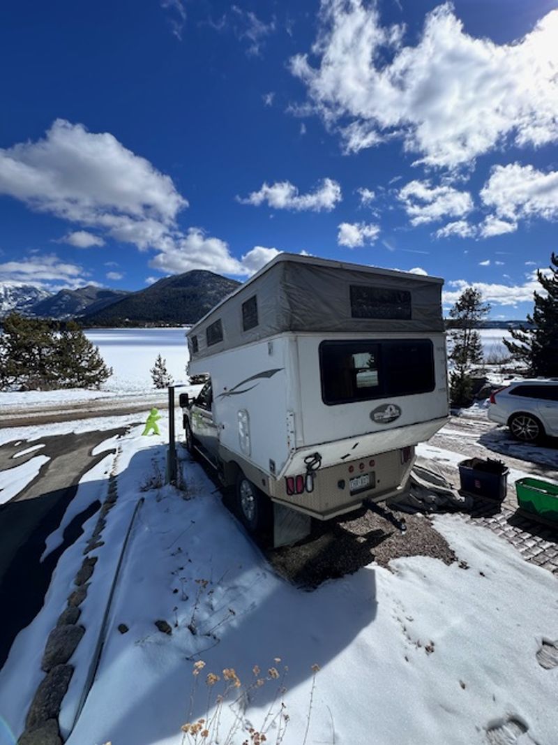 Picture 2/8 of a 2011 GMC Duramax with Phoenix Pop Up for sale in Grand Lake, Colorado