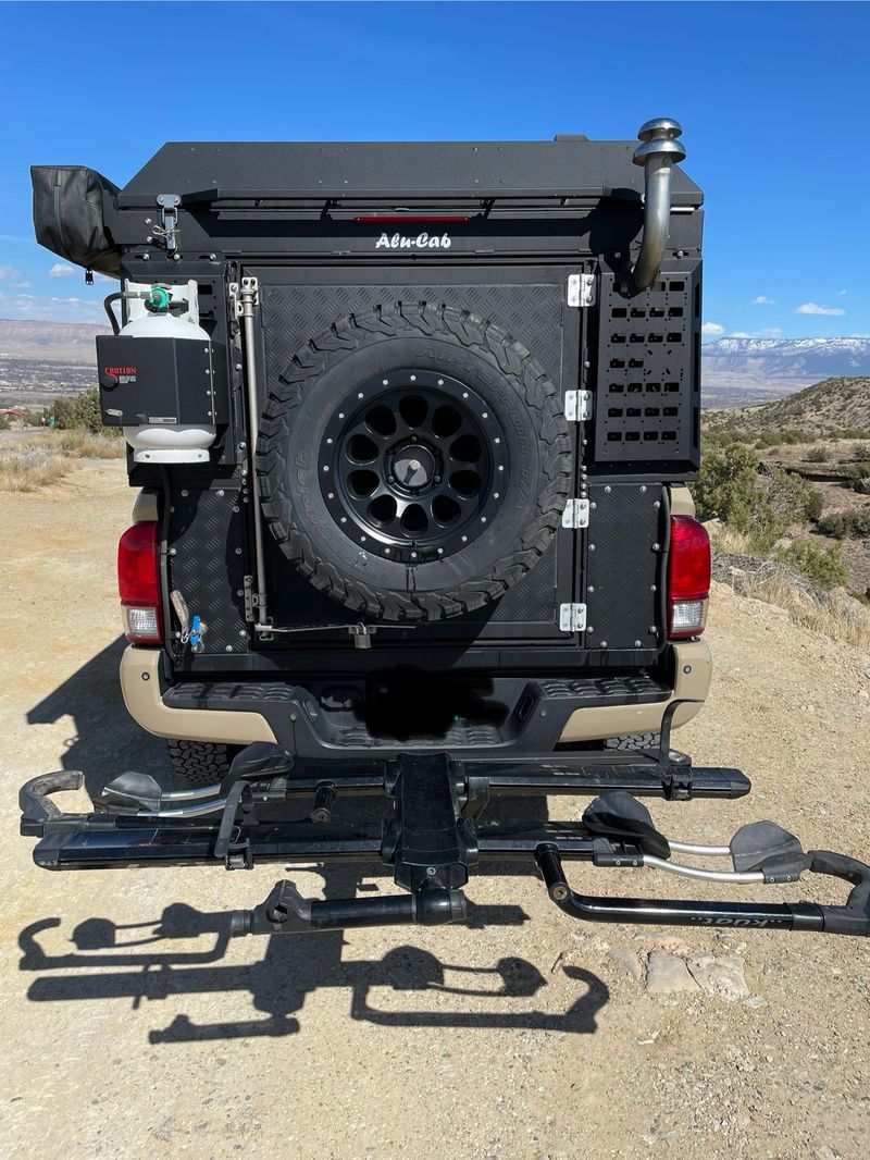 Picture 2/16 of a 2016 Toyota Tacoma TRD OR w/Alu-Cab Canopy Camper for sale in Denver, Colorado