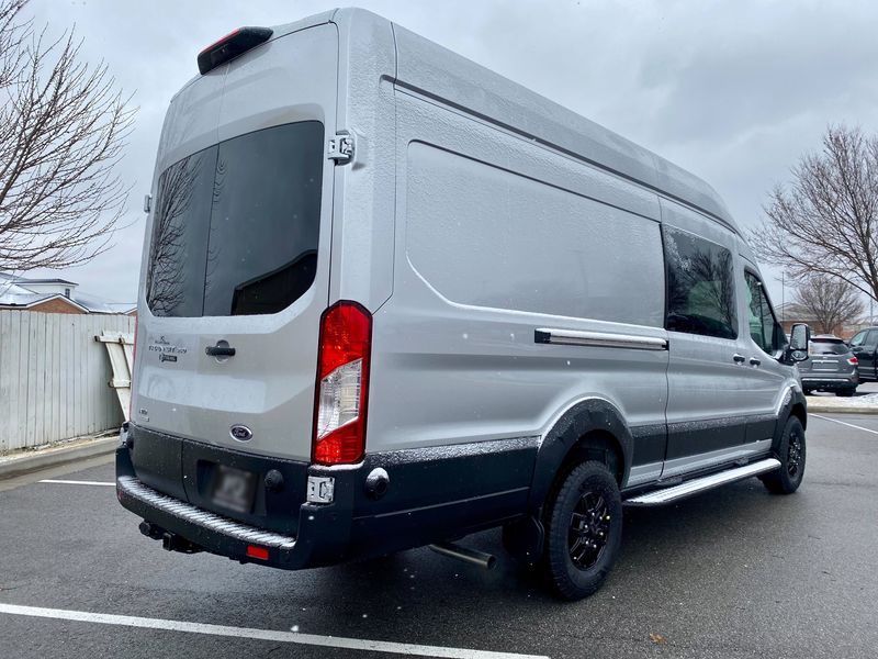 Picture 2/5 of a 2023 Ingot Silver Ford Transit 350 Trail High-Roof AWD for sale in Fayetteville, Arkansas