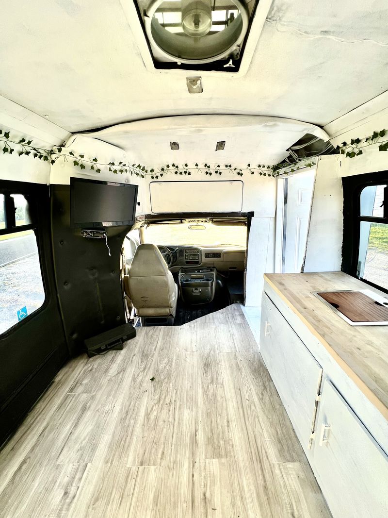 Picture 6/13 of a Boho Dream SKYLIGHT Shuttle Bus for sale in Saint Petersburg, Florida