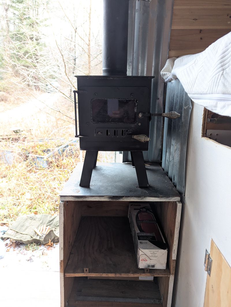 Picture 5/17 of a 2013 Nissan NV - partial conversion, solar and wood stove for sale in Reading, Pennsylvania