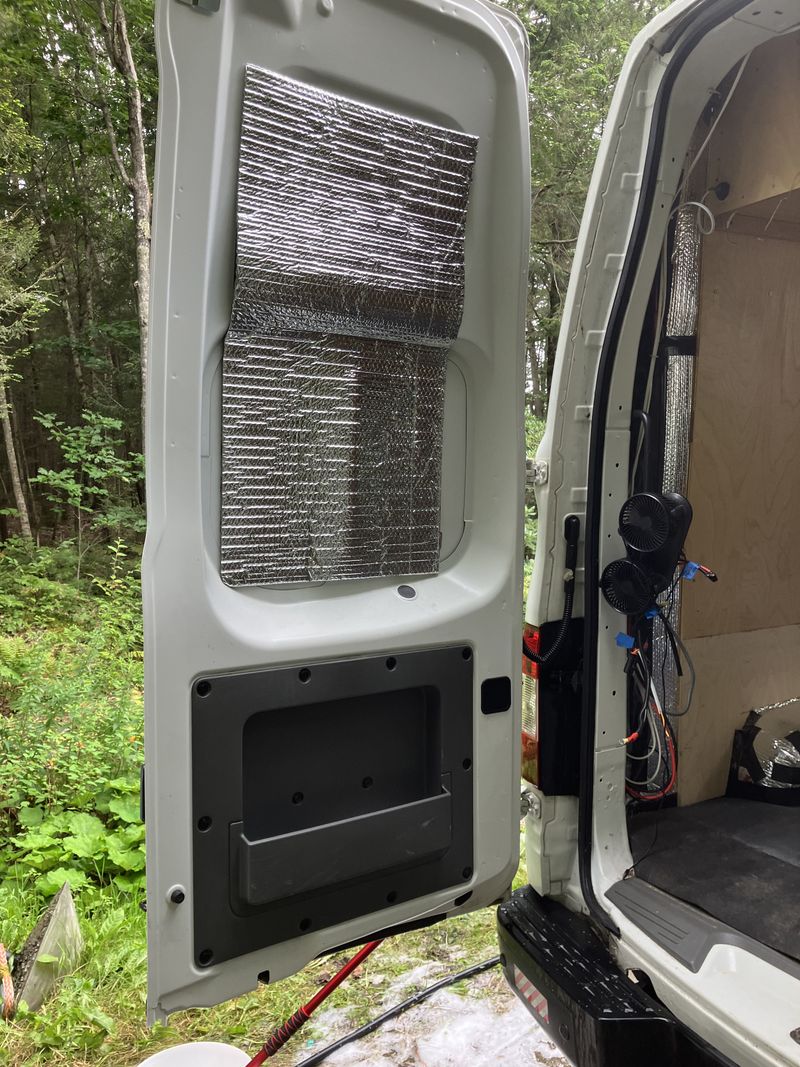 Picture 4/19 of a 2015 Nissan NV 2500 HD high top solar panels and fans for sale in Freeport, Maine