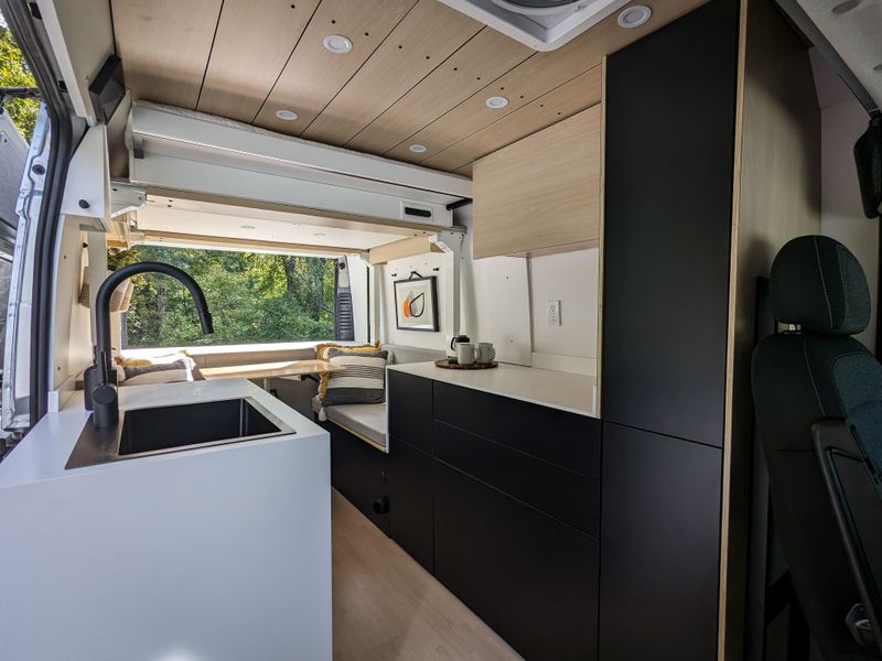 Picture 1/20 of a 2023 Promaster by Roamer Vans: modern design + elevator bed for sale in Rockville, Maryland