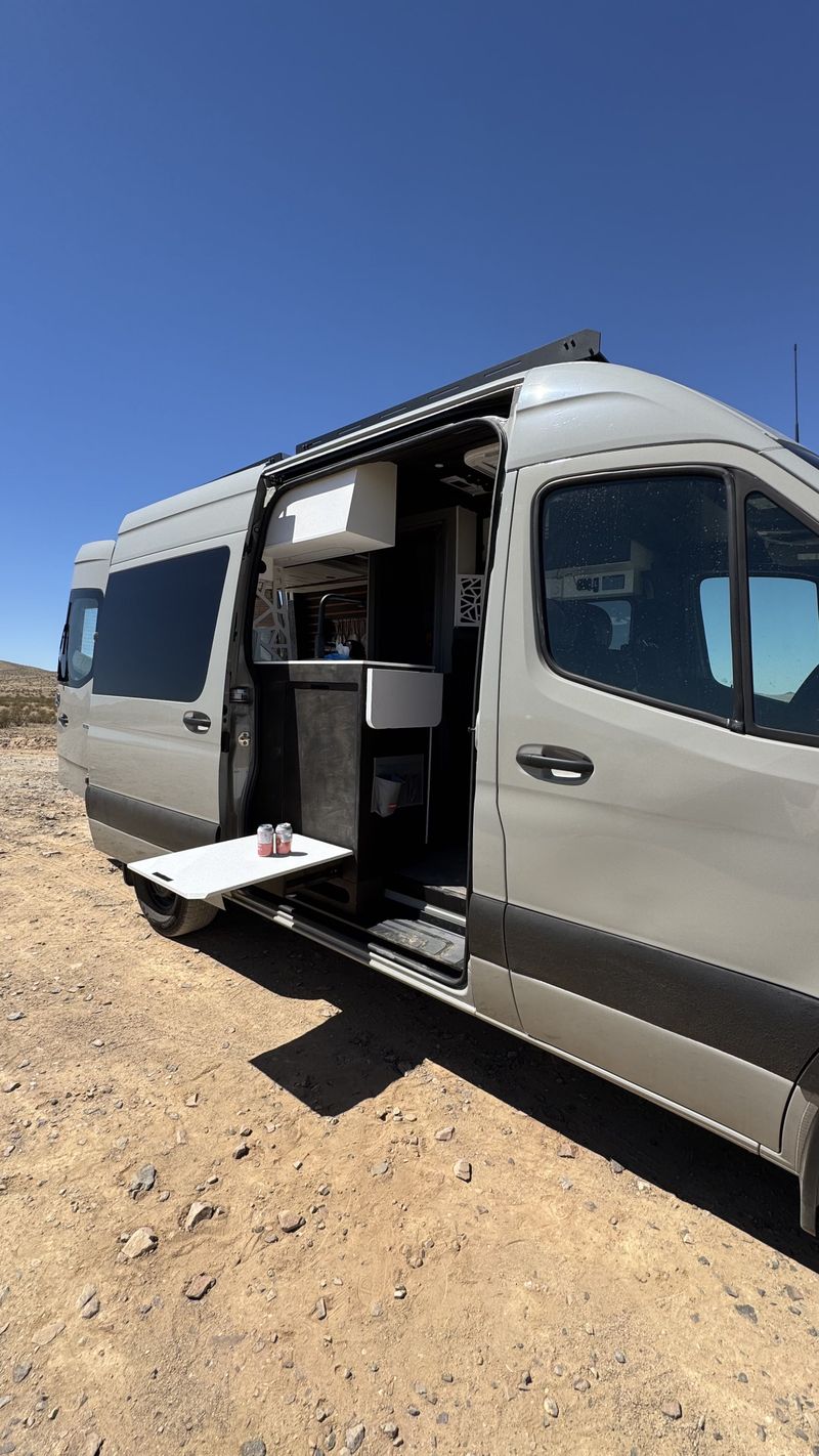 Picture 2/30 of a 144 Sprinter van / warranty / shower / sits 5 / bed lift for sale in Big Bear City, California