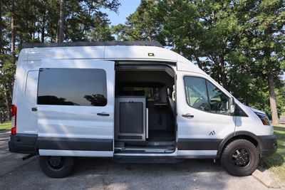Photo of a Camper Van for sale: 2023 Ford Transit Crew AWD Avalanche Gray Custom Build