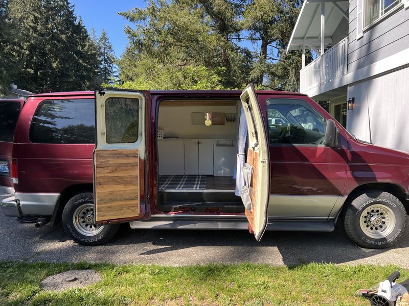 Picture 1/12 of a 2003 Ford e-150 econoline converted camper van for sale in Olympia, Washington
