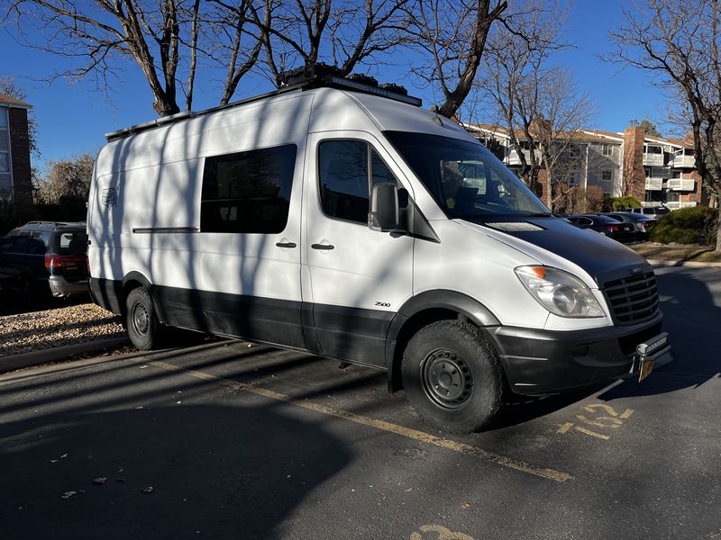Picture 1/14 of a 2013 Freightliner sprinter camper van for sale in Denver, Colorado