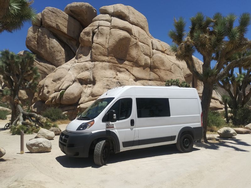 Picture 1/8 of a 2018 RAM Custom Adventure Promaster Hightop Camper for sale in Brooksville, Florida