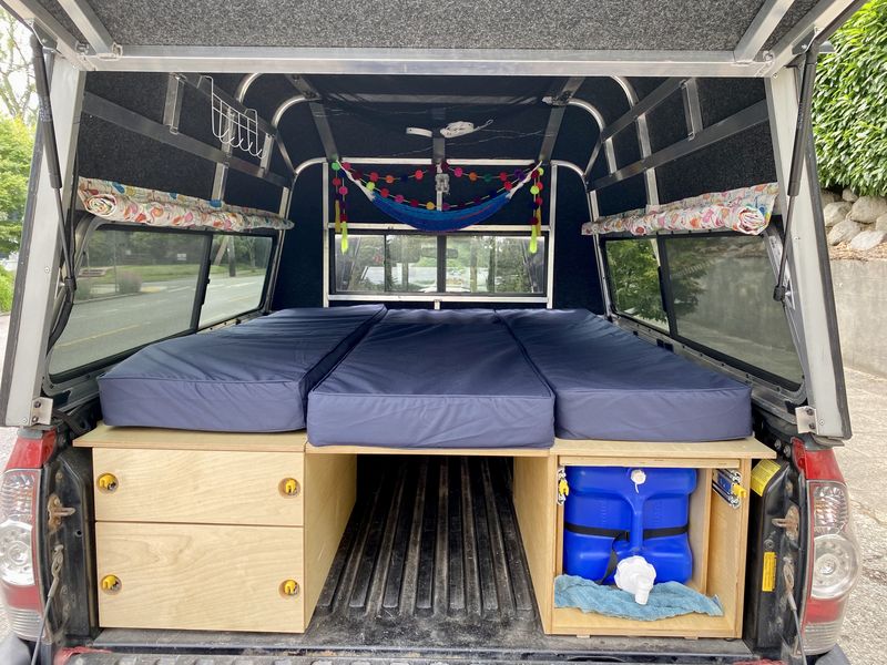 Picture 1/19 of a Toyota Tacoma with ARE Topper and Bed/Storage Buildout 4WD for sale in Las Vegas, Nevada