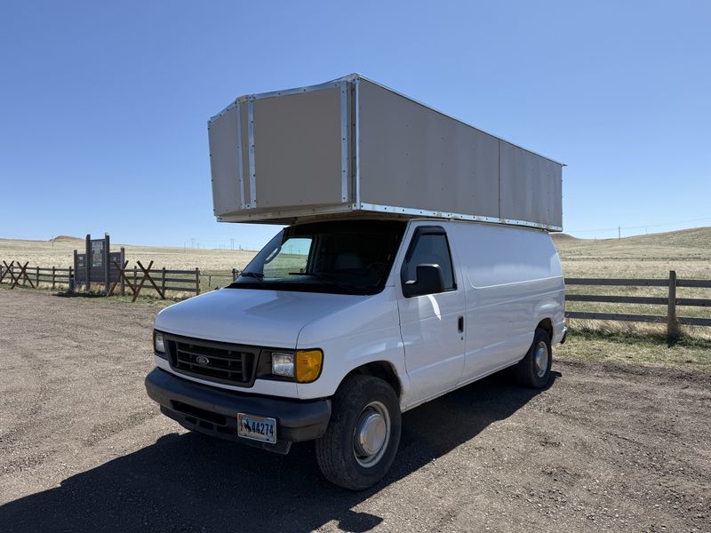Picture 1/42 of a 2005 Ford E350 Camper Van w/ DIY Cabover Hightop for sale in Gillette, Wyoming