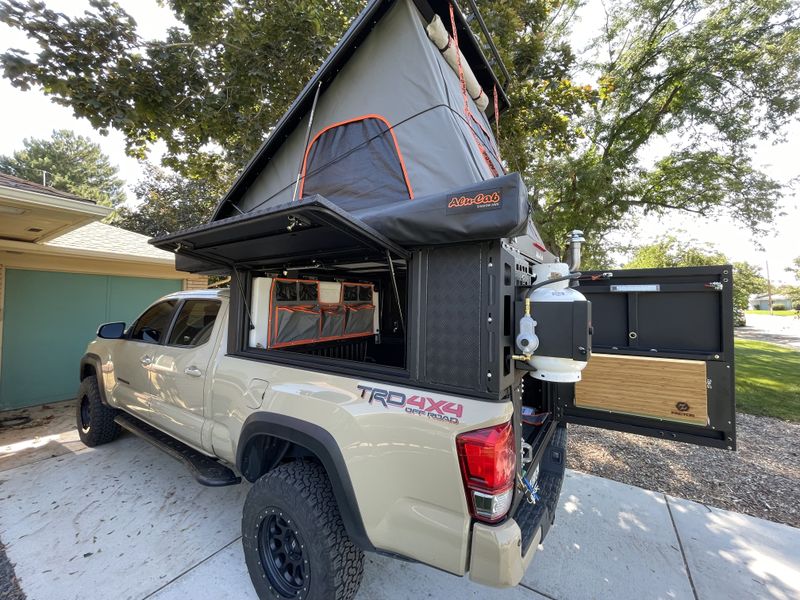 Picture 4/16 of a 2016 Toyota Tacoma TRD OR w/Alu-Cab Canopy Camper for sale in Denver, Colorado