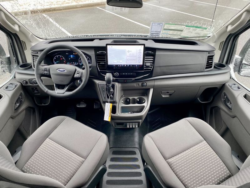 Picture 4/5 of a 2023 Ingot Silver Ford Transit 350 Trail High-Roof AWD for sale in Fayetteville, Arkansas