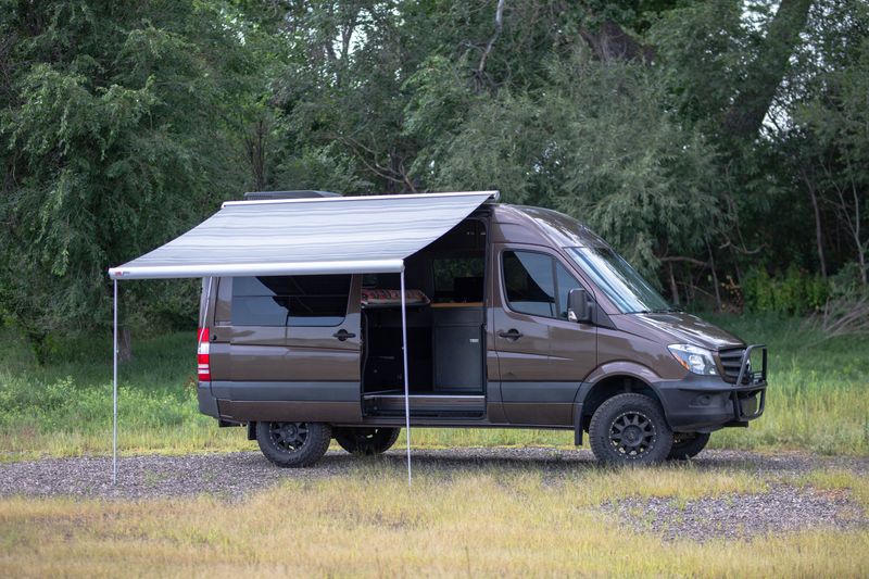 Picture 1/10 of a 2017 MERCEDES SPRINTER 144" HIGH ROOF 4X4 DIESEL for sale in Fort Collins, Colorado