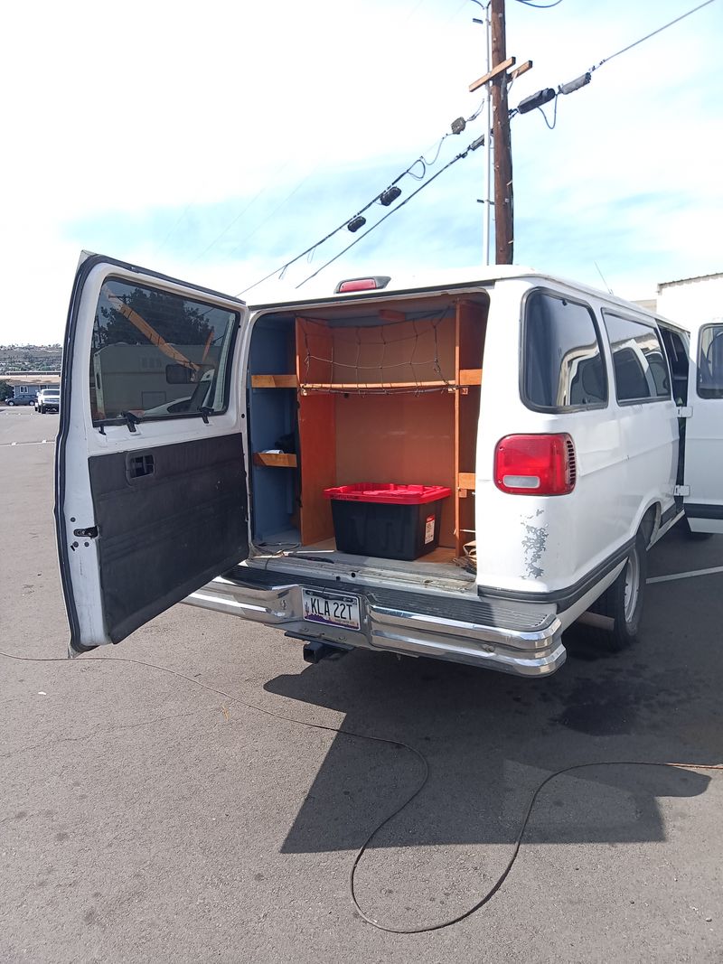 Picture 4/10 of a 2001 Chevy wagon converted with queen bed for sale in El Cajon, California