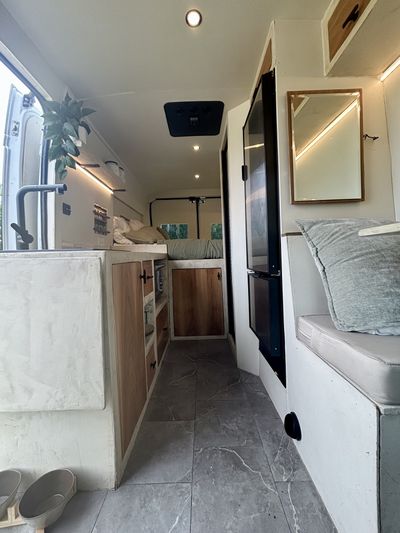 Photo of a Camper Van for sale: Minimalist Luxe Van Build- Cozy, Modern, and Road-Ready
