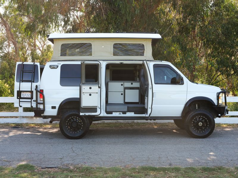 Picture 1/34 of a 2014 Ford E350 SD 4x4 Sportsmobile Van w/ Penthouse Top for sale in Santa Monica, California