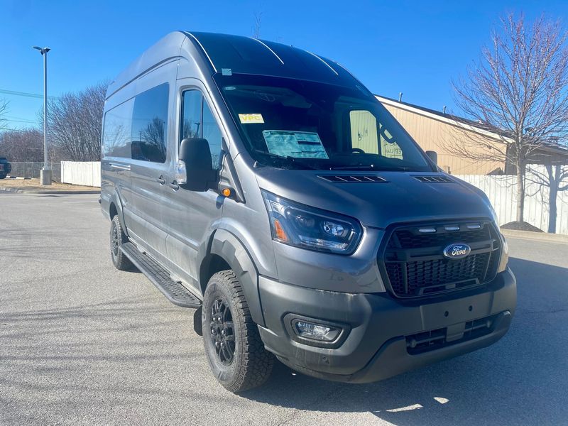 Picture 1/4 of a 2023 Carbonized Gray Ford Transit 350 Trail High-Roof EXT for sale in Fayetteville, Arkansas