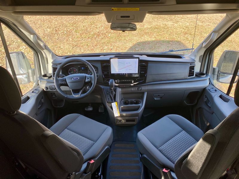 Picture 4/5 of a 2023 NEW Avalanche Gray Ford Transit 350 Trail High-Roof AWD for sale in Fayetteville, Arkansas