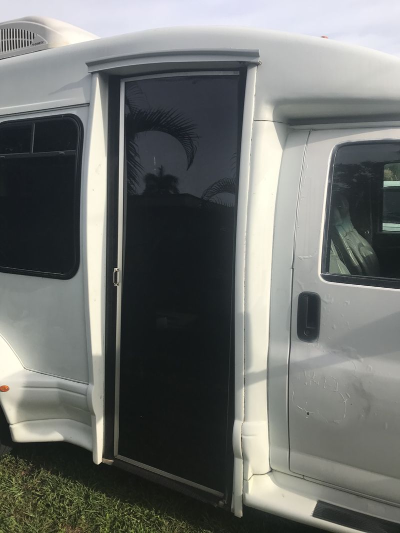 Picture 4/22 of a Chevy Express 3500 Turtle top Shuttle bs Rv Conversion for sale in North Fort Myers, Florida