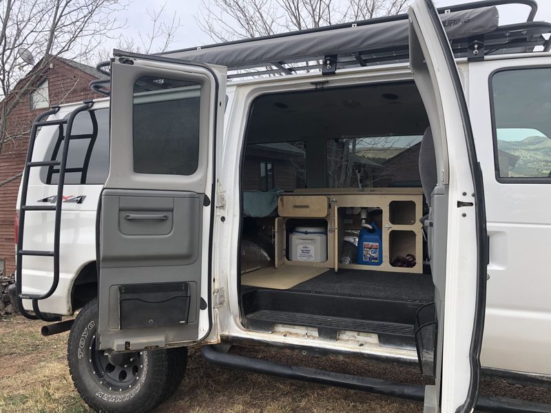 Picture 3/13 of a 2007 Ford E-350 Econoline 4x4 Quigley Conversion Camper Van for sale in Loveland, Colorado