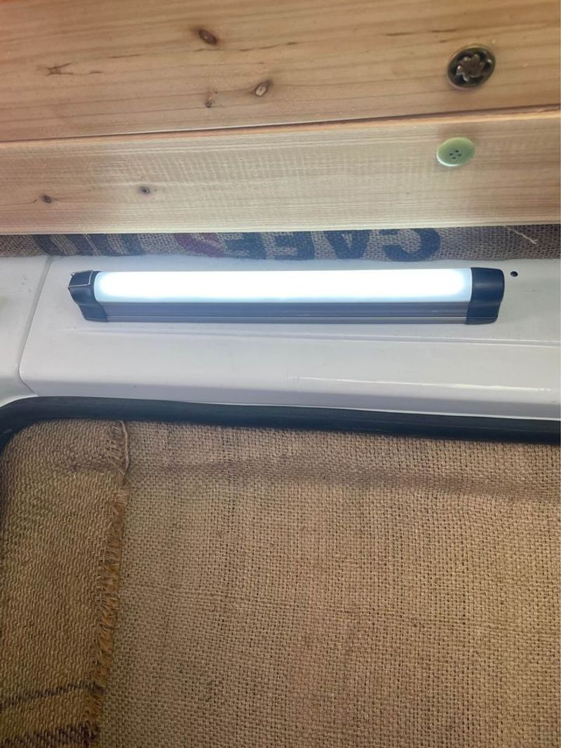 Picture 2/18 of a Nissan NV microcamper with solar for sale in Boulder, Colorado