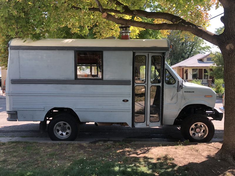 Picture 1/12 of a 1985 Ford E350/Skoolie 4x4 for sale in Salt Lake City, Utah