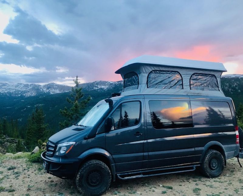 Picture 1/29 of a 2015 Mercedes Sprinter 144 4x4 with Pop Top! for sale in Loveland, Colorado