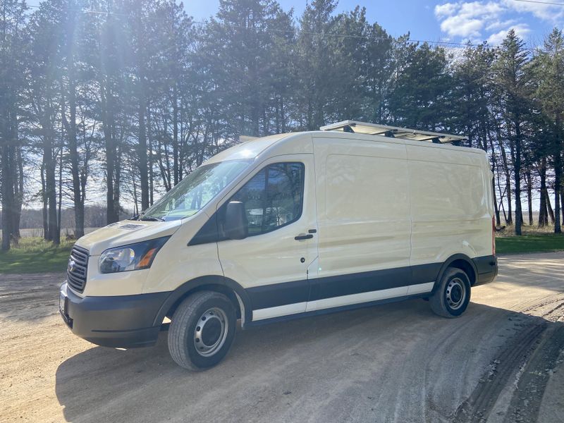 Picture 4/10 of a 2015 Ford Transit long wheel base mid roof for sale in Mankato, Minnesota